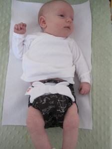 Emily modeling her math-y diaper (Flip diaper in Albert print)